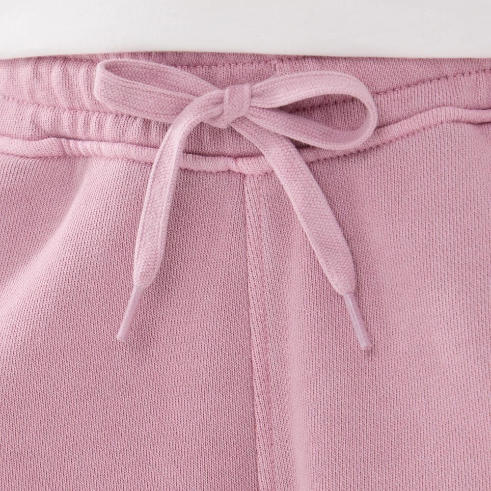 The model is wearing this New Era Originators Oversized Shorts in pink. 3