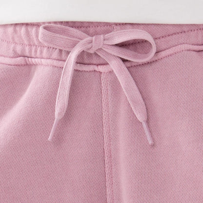 The model is wearing this New Era Originators Oversized Shorts in pink. 3