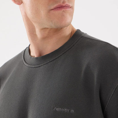The model is wearing this New Era Originators Crew Neck Sweater in black. 3