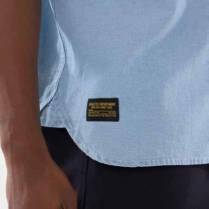 The model is wearing this New Era Originators Chambray Short Sleeve Shirt in bright blue. 6