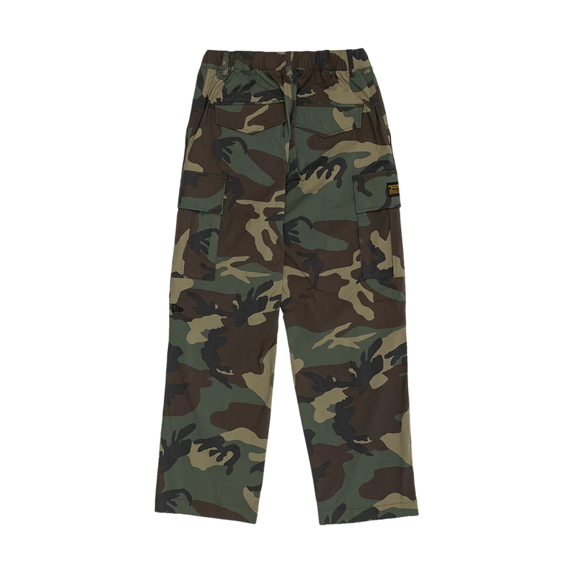 The model is wearing this New Era Originators Cargo Trousers in dark green. 2