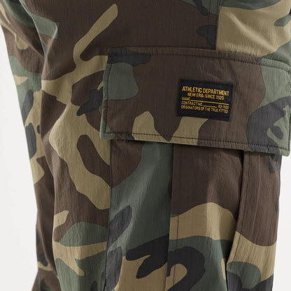 The model is wearing this New Era Originators Cargo Trousers in dark green. 5