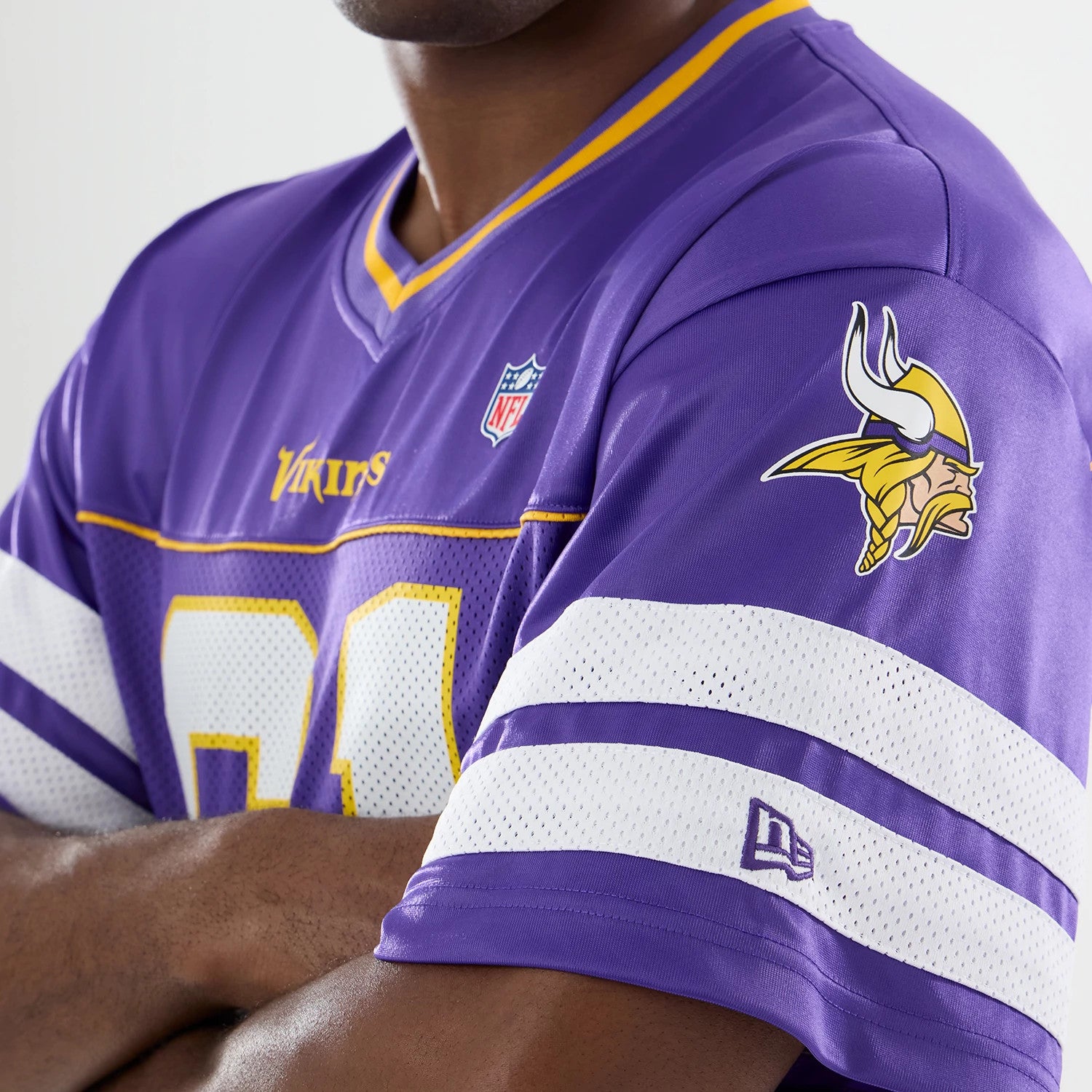 The model is wearing this NFL Minnesota Vikings Mesh Jersey in purple. 3