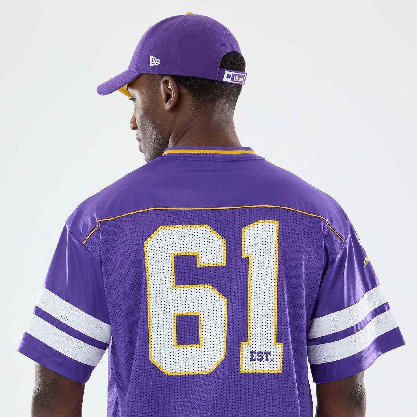 The model is wearing this NFL Minnesota Vikings Mesh Jersey in purple. 5