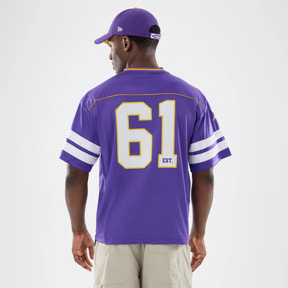 The model is wearing this NFL Minnesota Vikings Mesh Jersey in purple. 2