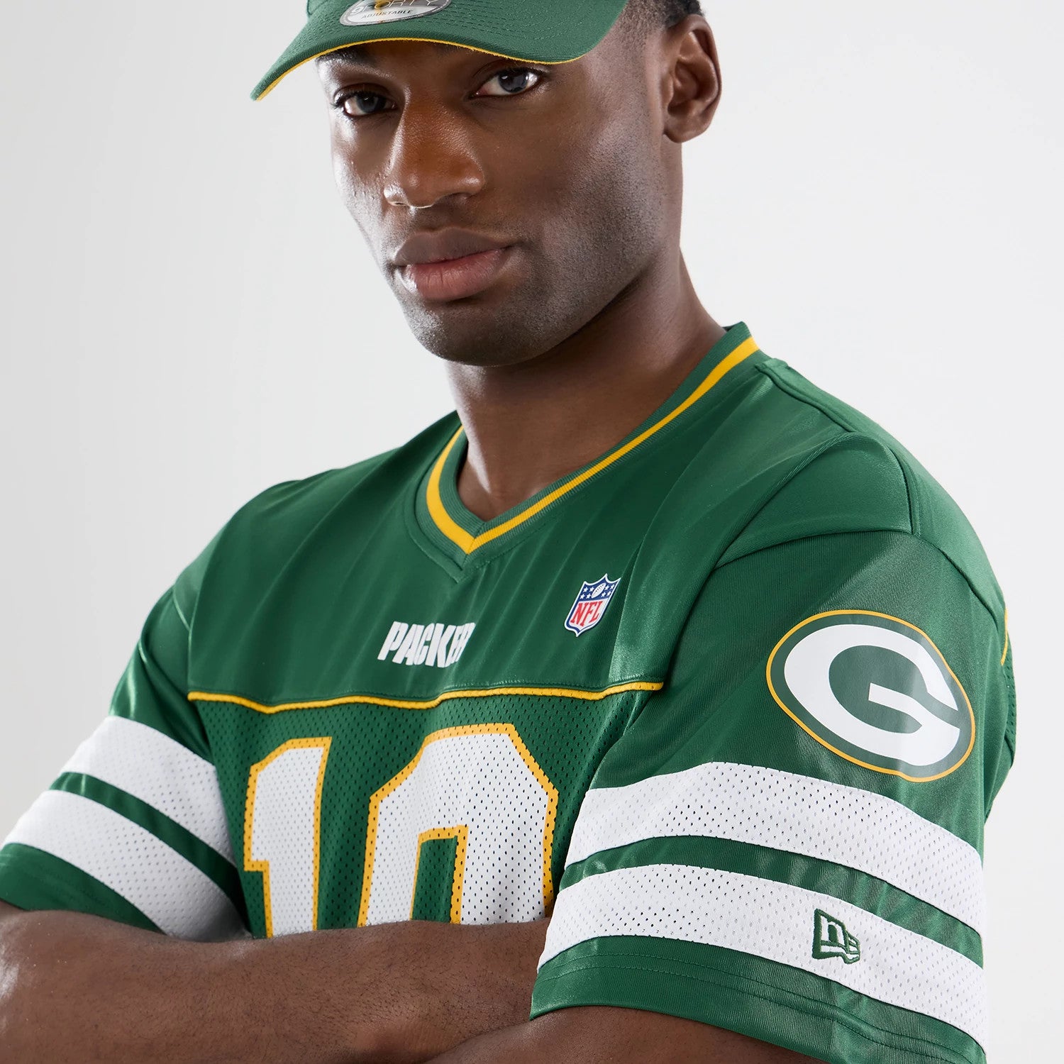 The model is wearing this NFL Green Bay Packers Mesh Jersey in green. 3