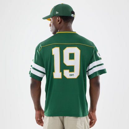 The model is wearing this NFL Green Bay Packers Mesh Jersey in green. 2