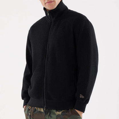 The model is wearing this New Era Black Label Jacket in black. 3