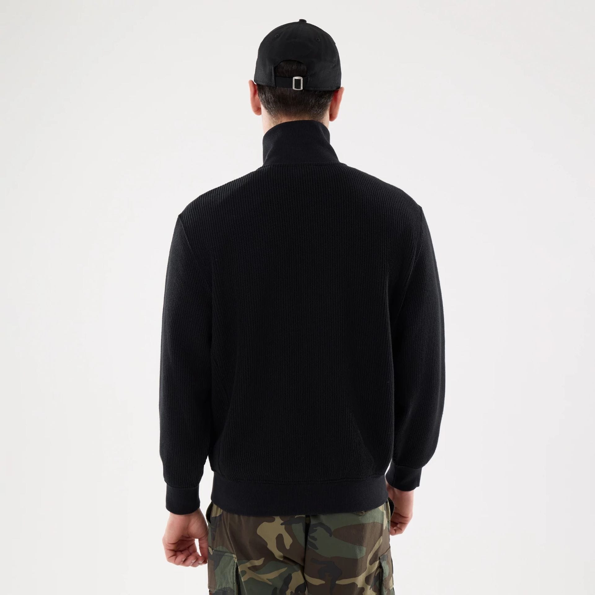 The model is wearing this New Era Black Label Jacket in black. 2