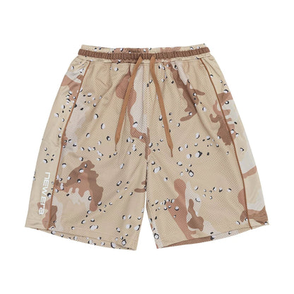 The model is wearing this New Era Bermuda Oversized Shorts in Woodland Camo. 1