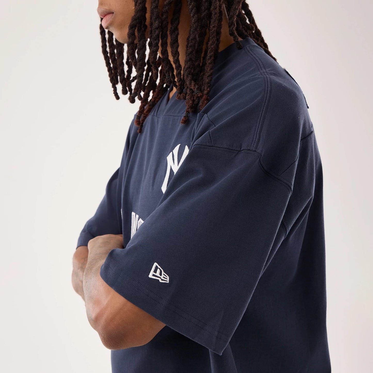 The model is wearing this MLB Fan Family New York Yankees Jersey in navy. 5