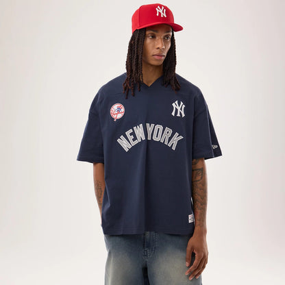 The model is wearing this MLB Fan Family New York Yankees Jersey in navy. 1