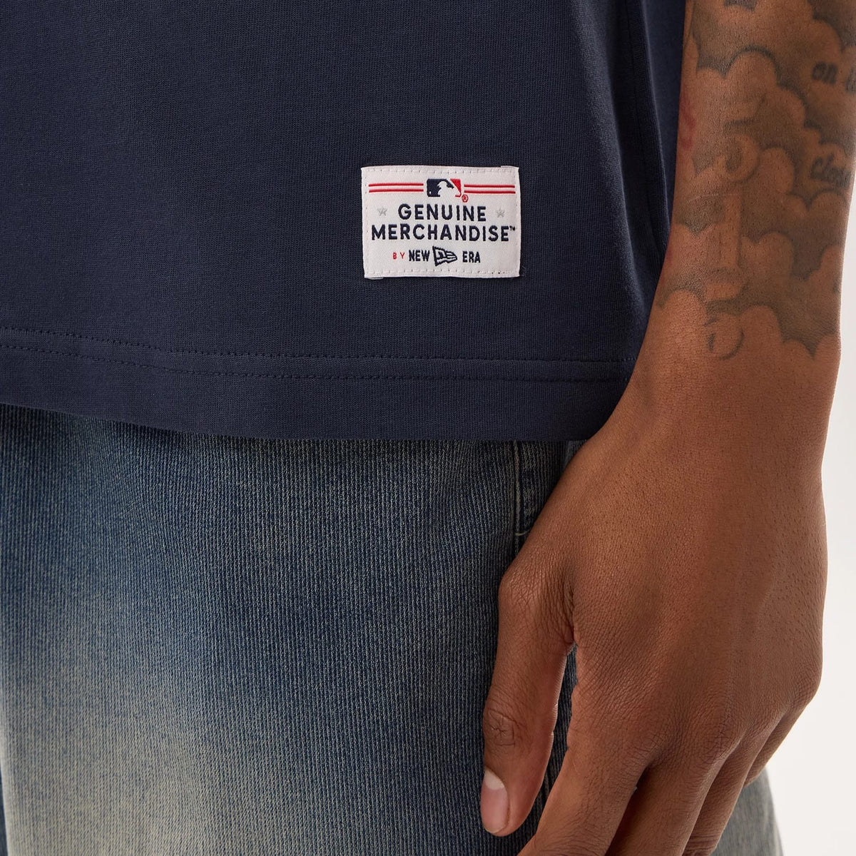 The model is wearing this MLB Fan Family New York Yankees Jersey in navy. 7