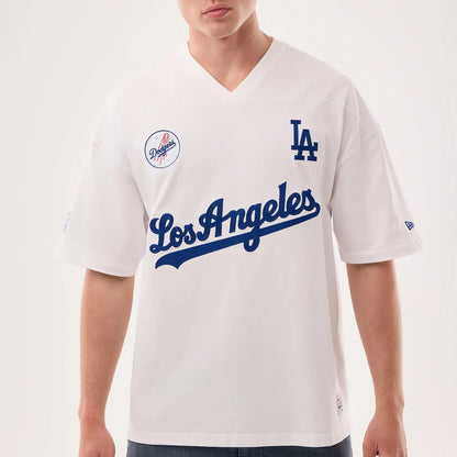 The model is wearing this MLB Fan Family Los Angeles Dodgers Jersey in white. 4