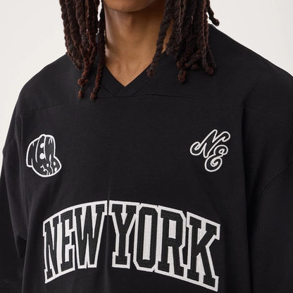 The model is wearing this New Era Fan Family Jersey in black. 4