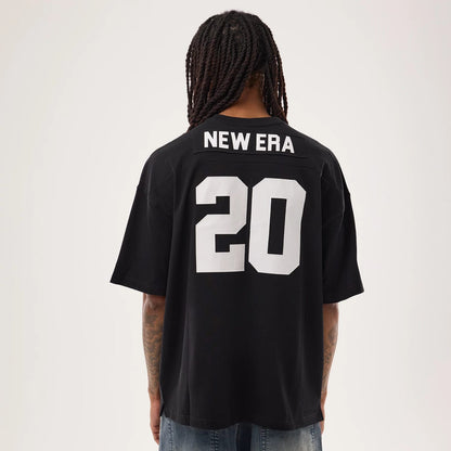The model is wearing this New Era Fan Family Jersey in black. 2