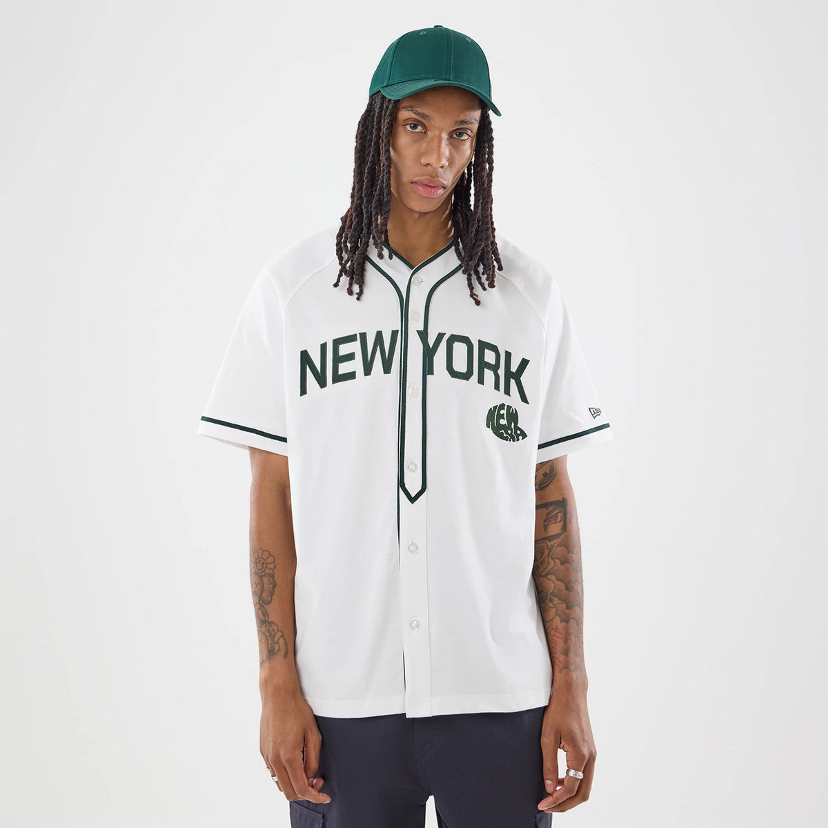 The model is wearing this New Era New York Jersey in white. 1