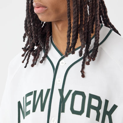 The model is wearing this New Era New York Jersey in white. 3