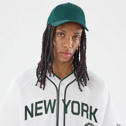 The model is wearing this New Era New York Jersey in white. 6