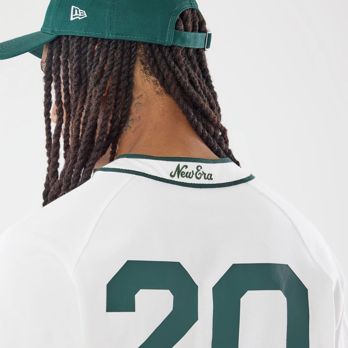 The model is wearing this New Era New York Jersey in white. 5