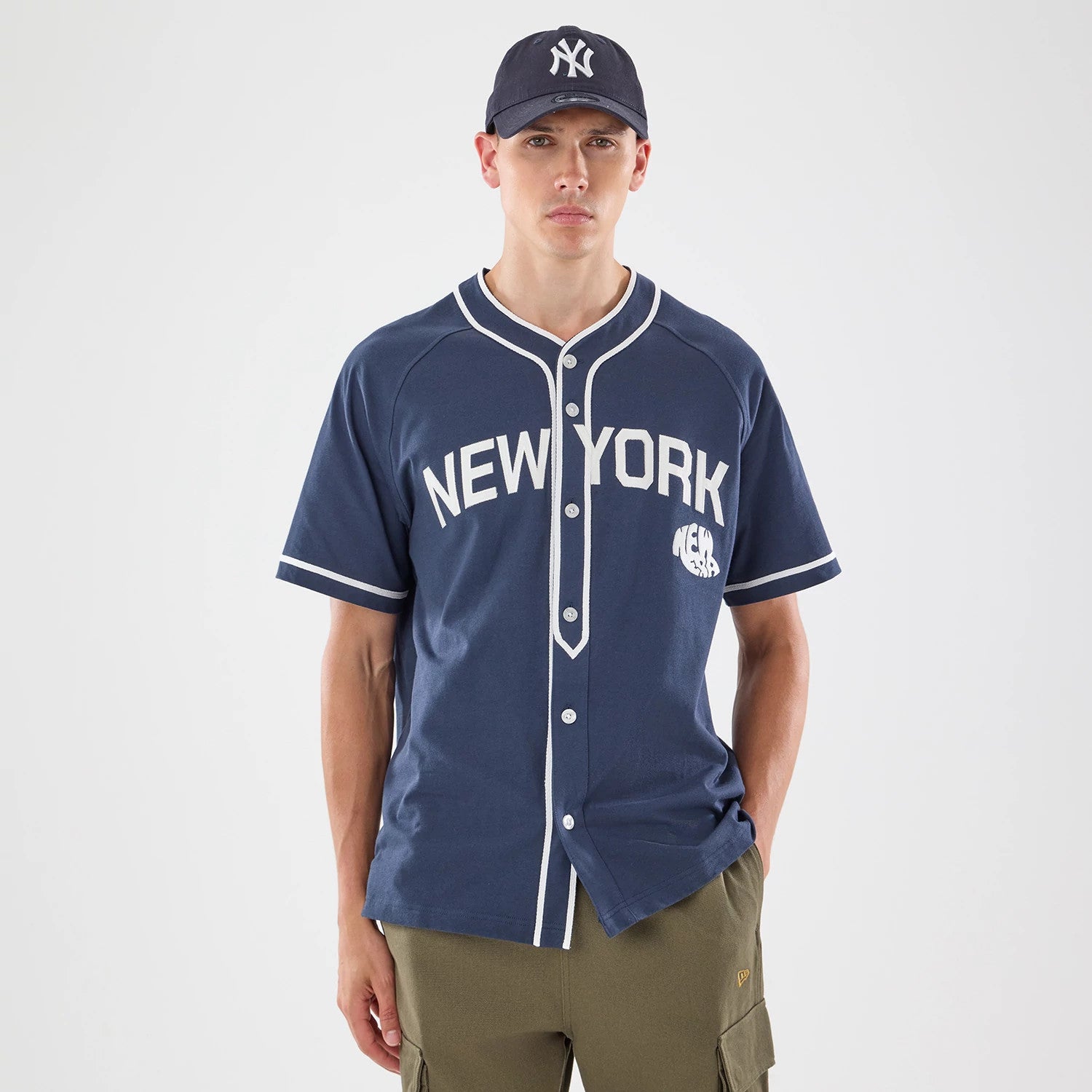The model is wearing this New Era New York Jersey in navy. 1