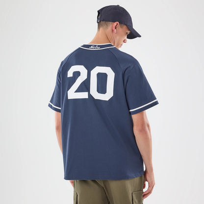 The model is wearing this New Era New York Jersey in navy. 2