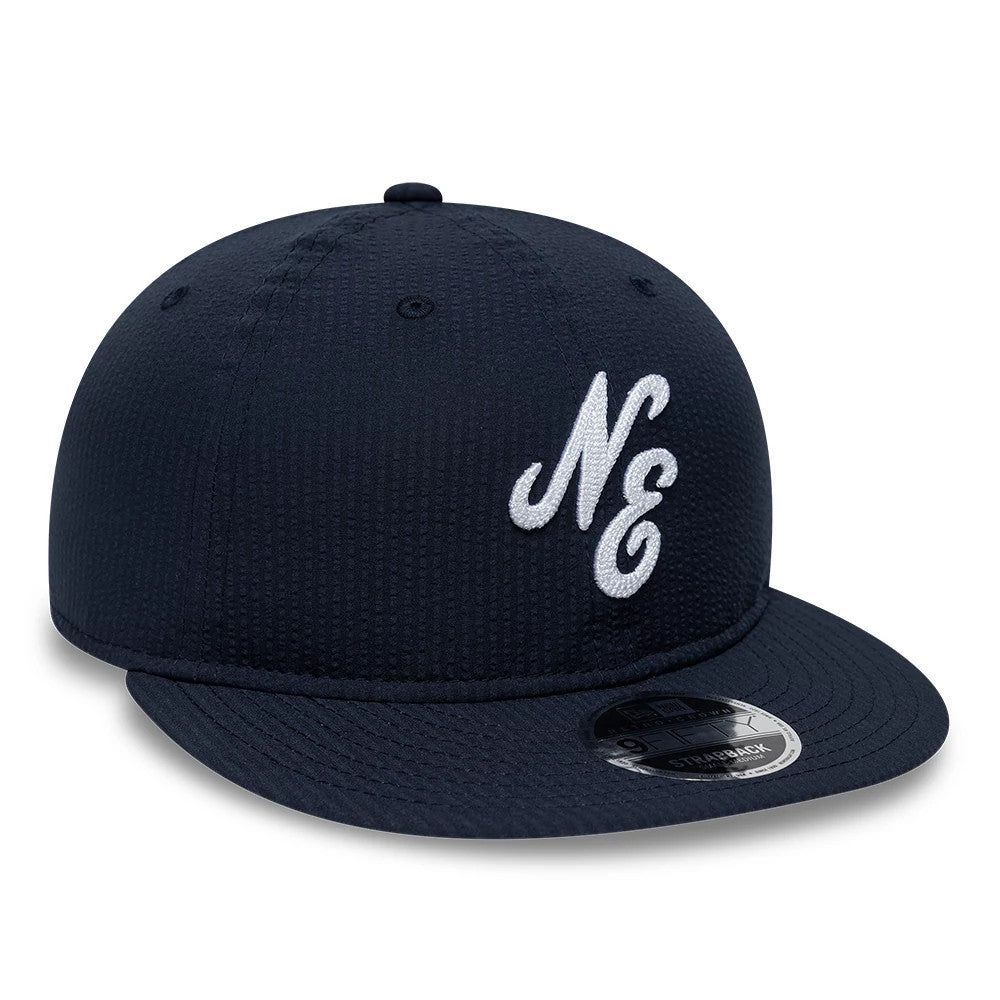 Pictured is this New Era Seersucker Retro Crown 9FIFTY cap in navy. 3