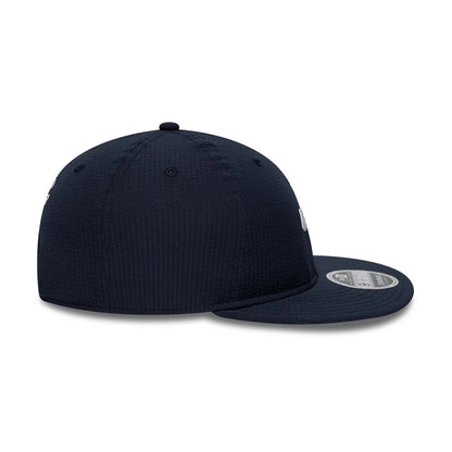 Pictured is this New Era Seersucker Retro Crown 9FIFTY cap in navy. 6