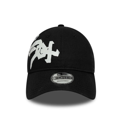 Pictured is this MLB Spray Paint Chicago White Sox 9FORTY cap in black. 2