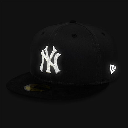 Pictured is this MLB Reflective New York Yankees 59FIFTY Fitted cap in charcoal & black. 3