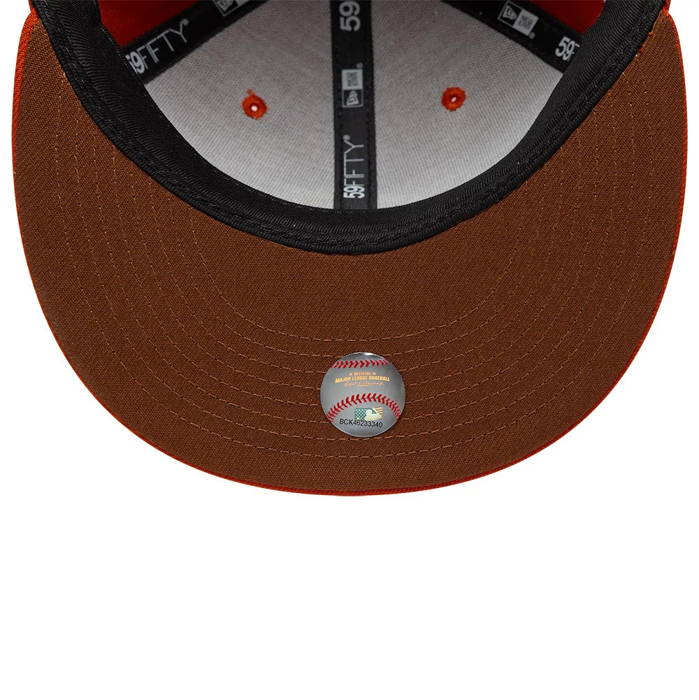 Pictured is this MLB Pack Chicago Cubs 59FIFTY Fitted cap in dark orange. 2