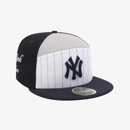 Pictured is this MLB 59FIFTY Day New York Yankees Split Panel 59FIFTY Fitted cap in navy. 3