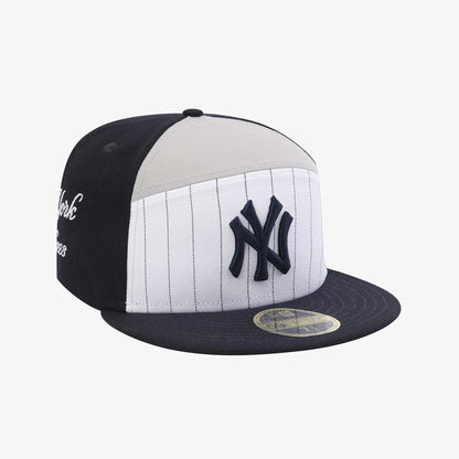 Pictured is this MLB 59FIFTY Day New York Yankees Split Panel 59FIFTY Fitted cap in navy. 3
