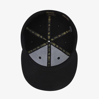Pictured is this New Era 59FIFTY Day 59FIFTY Fitted cap in black. 7
