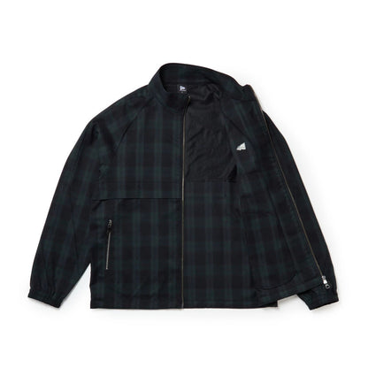 The model is wearing this New Era Blouson Plaid Windbreaker Jacket in Navy. 14