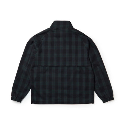The model is wearing this New Era Blouson Plaid Windbreaker Jacket in Navy. 8
