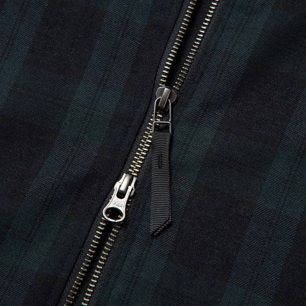 The model is wearing this New Era Blouson Plaid Windbreaker Jacket in Navy. 10