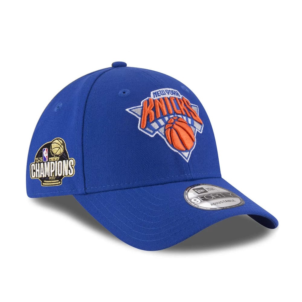Pictured is this NBA Finals Champions 2026 New York Knicks 9FORTY cap in blue. 1