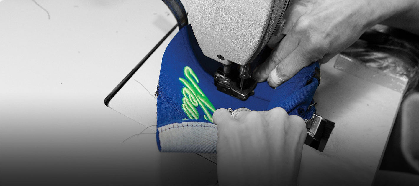 step 13 from 22 steps to make a 5950 cap, fabric is applied to the seams.