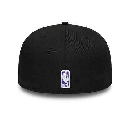 LA Lakers NBA Black New Era 59FIFTY Fitted Cap, rear view showing the white and purple embroidered NBA logo centred on the black back panels, with a structured crown and black top button.
