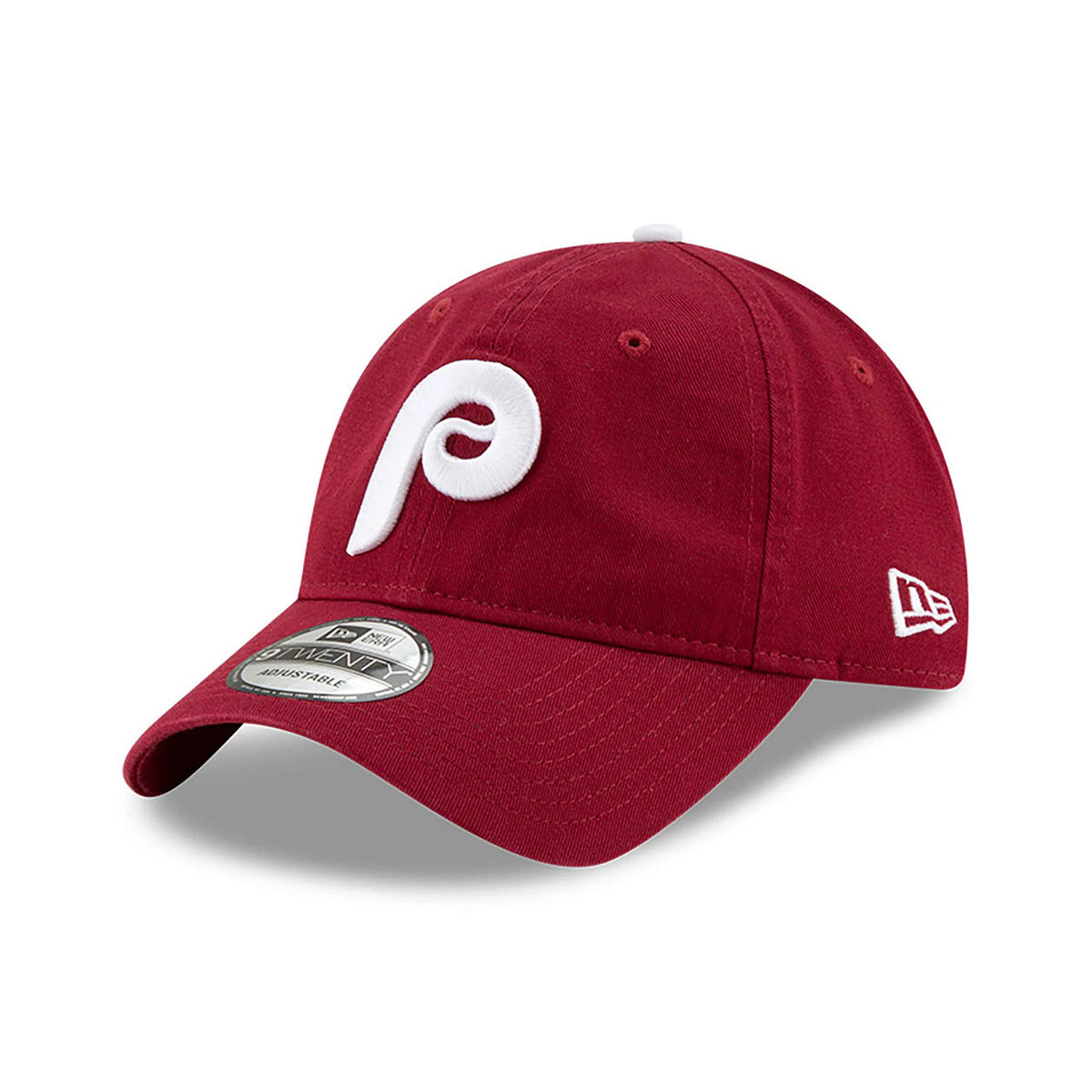 Philadelphia Phillies MLB Core Classic Red New Era 9TWENTY Adjustable Cap, three-quarter view showing raised white embroidered P logo on the front panel, curved visor with 9TWENTY size sticker, and New Era flag logo on the left side.