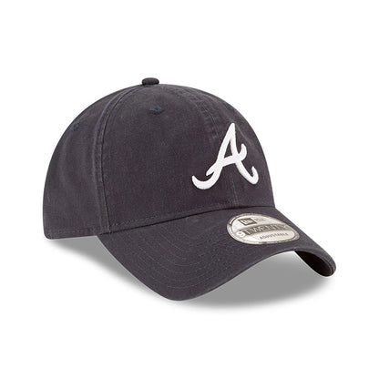 Atlanta Braves MLB Core Classic Navy New Era 9TWENTY Adjustable Cap, front view with a white embroidered A logo on the front panel, a curved visor and a 9TWENTY size sticker on the navy fabric.