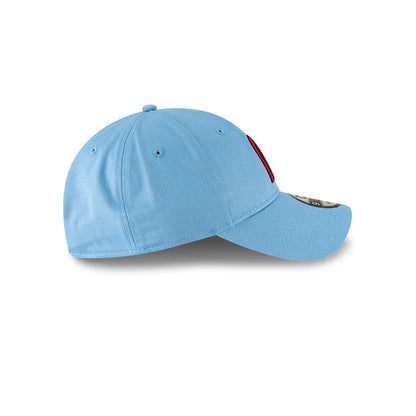 Philadelphia Phillies MLB Core Classic Pastel Blue New Era 9TWENTY Adjustable Cap, side view showing the red embroidered Phillies logo on the front panel, curved visor, and pastel blue crown with eyelets.
