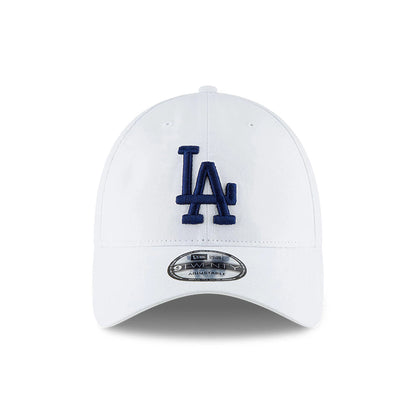 LA Dodgers MLB Core Classic White New Era 9TWENTY Adjustable Cap, front view with the raised blue LA logo embroidered on the front panel, featuring a curved visor and the 9TWENTY size sticker on the visor.