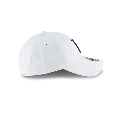 LA Dodgers MLB Core Classic White New Era 9TWENTY Adjustable Cap, side view showing the blue embroidered LA logo on the front and the curved white visor with a 9TWENTY size sticker.