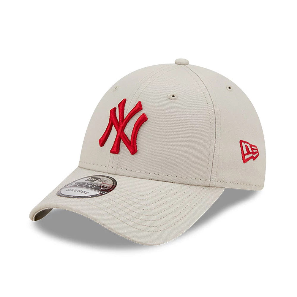 New York Yankees League Essential Stone New Era 9FORTY Cap, three-quarter view showing a red embroidered NY logo on the front panel, matching red New Era flag logo on the left side, and 9FORTY size sticker on the curved visor.