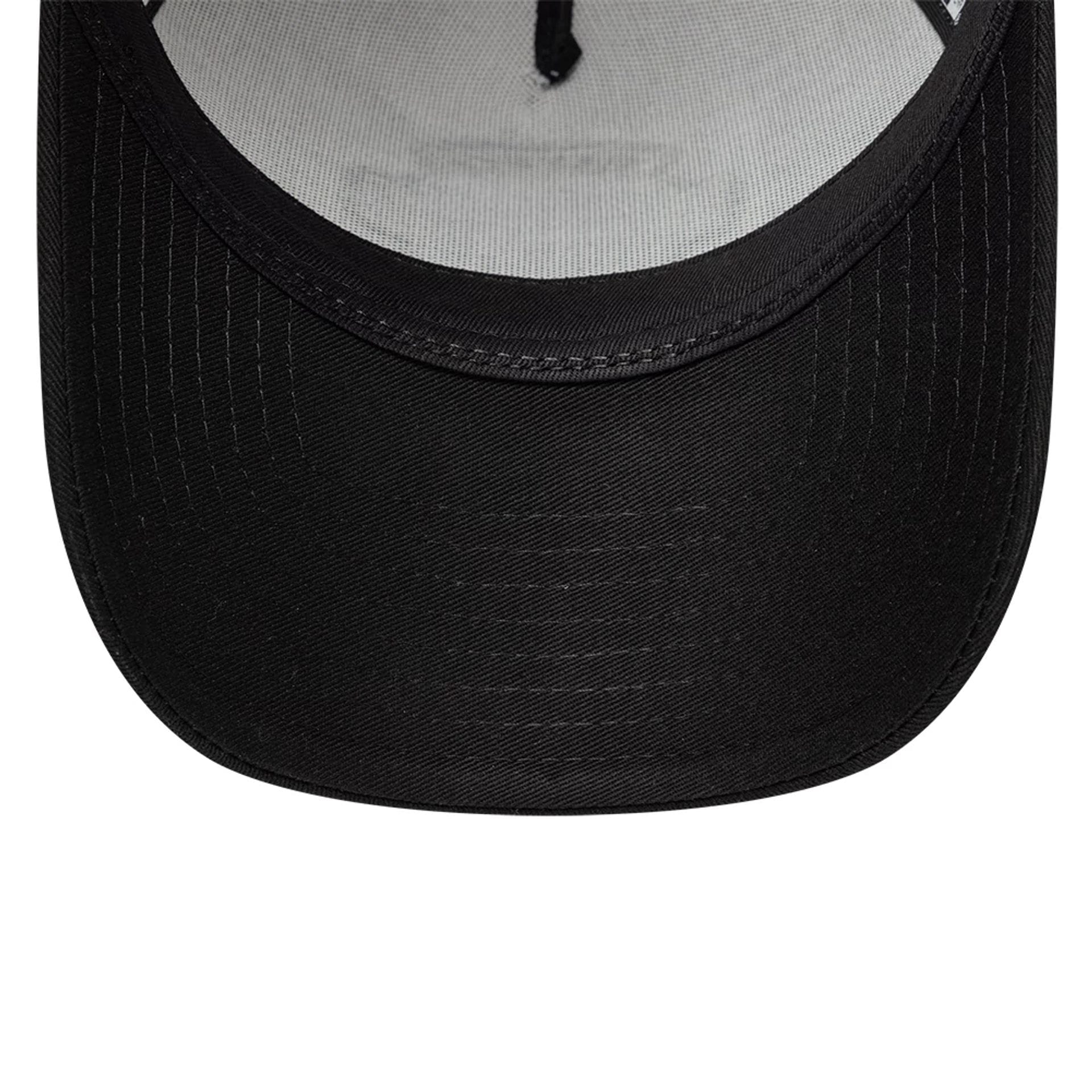 Pictured is this New Era Location Icon 9FORTY A-Frame Trucker Adjustable cap in black. 7