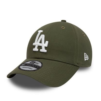 LA Dodgers League Essential Green New Era 9TWENTY Adjustable Cap, front view with a white raised LA logo on the front panel, a 9TWENTY size sticker on the visor, and a New Era flag logo embroidered on the left side.