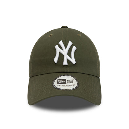 New York Yankees League Essential Green New Era 9TWENTY Adjustable Cap, front view showing the white raised embroidered NY logo on the front panel, with a curved visor and a 9TWENTY size sticker displayed prominently.