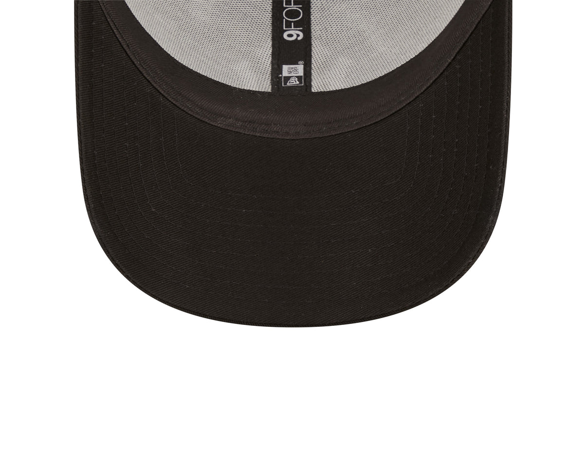 New York Yankees Home Field Black New Era 9FORTY A-Frame Trucker Cap, inside view showing the grey undervisor, black sweatband and central black taping with a white 9FORTY label and branding beneath the visor.
